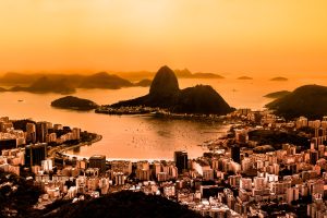 Rio de Janeiro, Brazil. Suggar Loaf and Botafogo beach viewed from Corcovado at sunset. Rio de Janeiro is the 2016 summer olympic games hosting city.